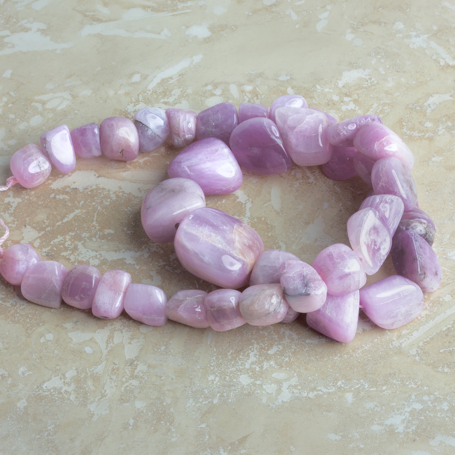 10 - 22mm Kunzite Plain Nuggets 16 inch 38 beads - The Bead Traders