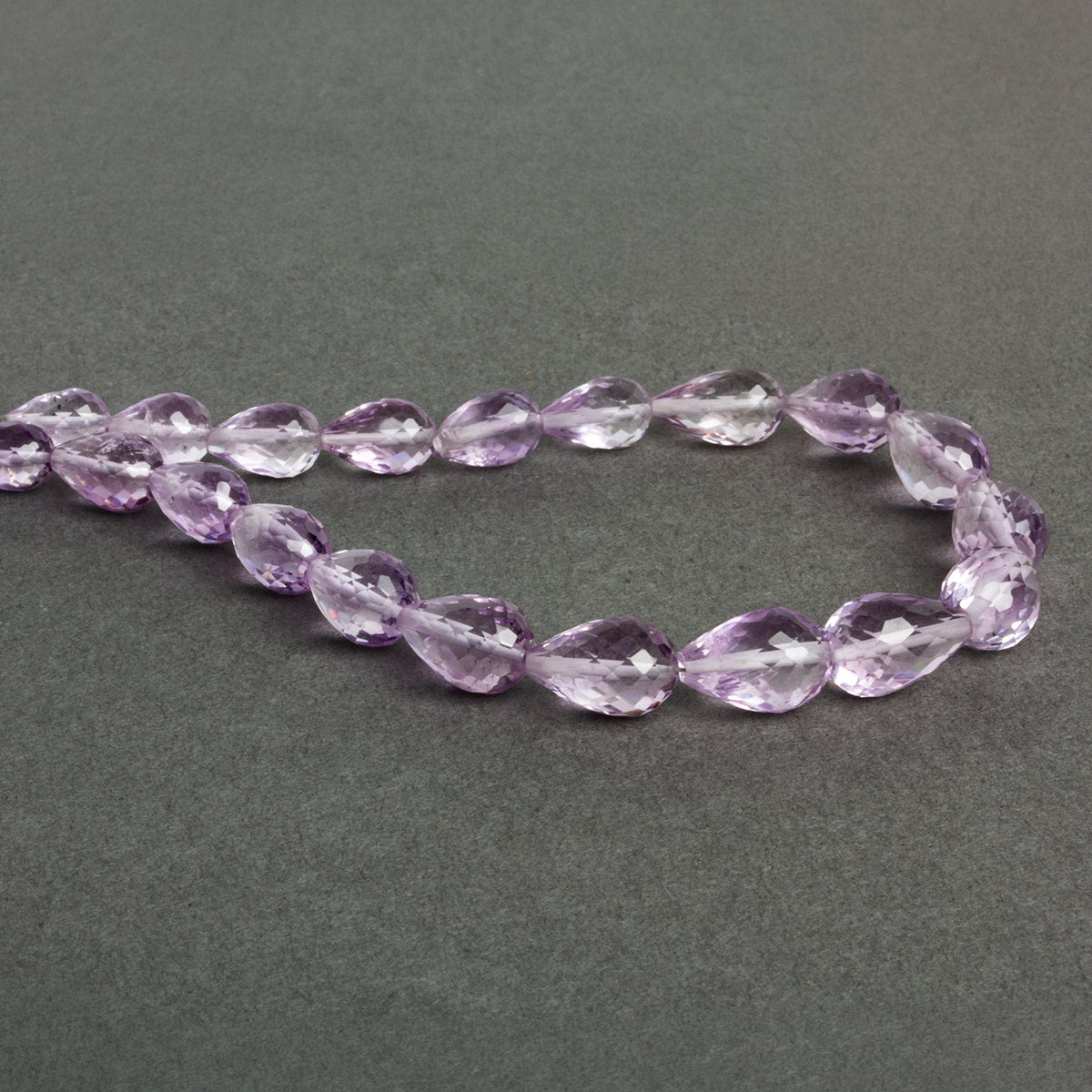 10x7mm Pink Amethyst Faceted Teardrops 8 inch 20 beads - The Bead Traders