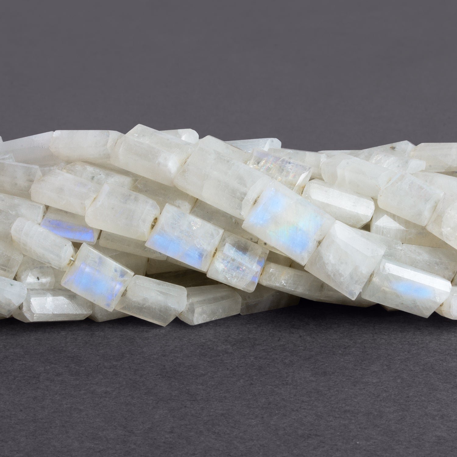 10x7mm Rainbow Moonstone Faceted Rectangles 15 inch 43 beads - The Bead Traders