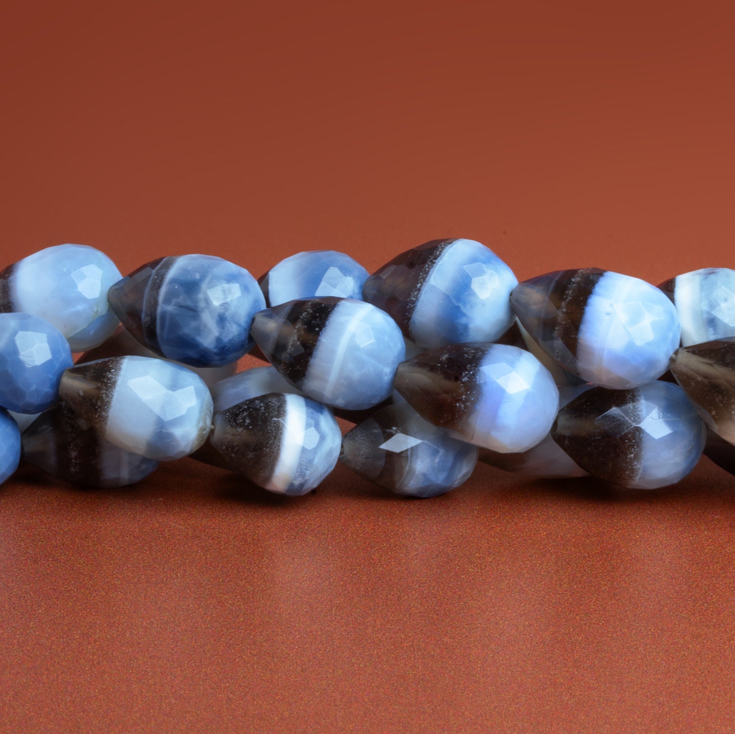 11x8mm Denim Opal Faceted Teardrops 7.5 inch 15 beads - The Bead Traders