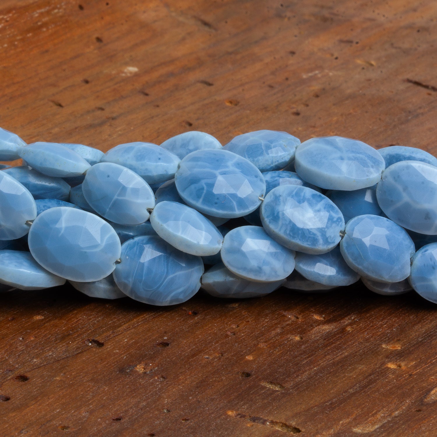 11x8mm Owyhee Denim Opal Faceted Ovals 7.5 inch 16 beads - The Bead Traders