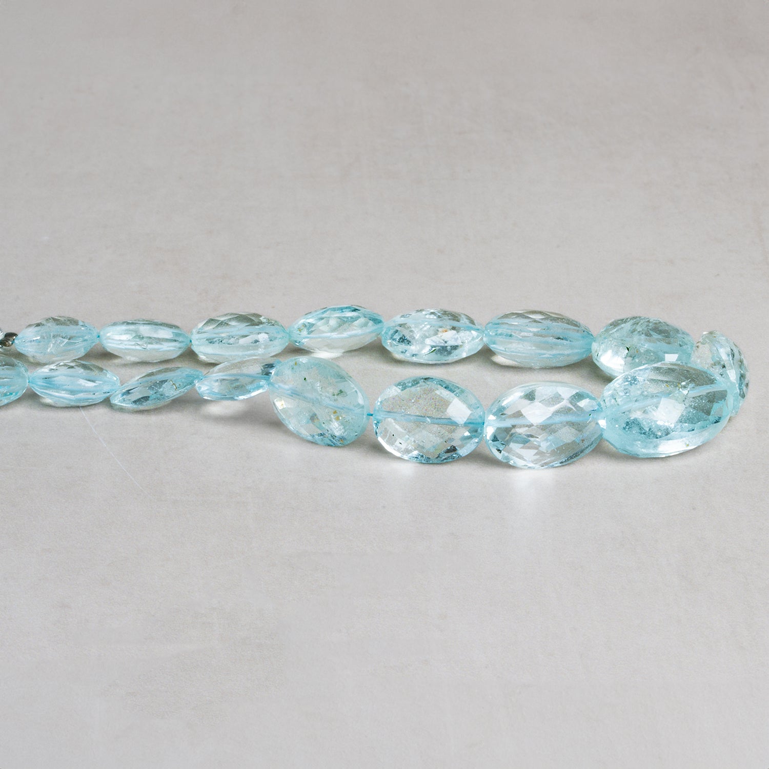 13x10mm Aquamarine Faceted Ovals 7.5 inch 15 beads - The Bead Traders