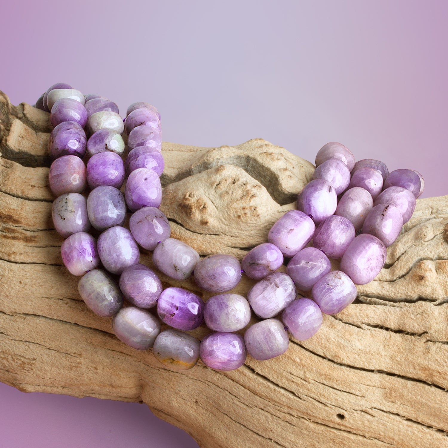 13x11mm Kunzite Plain Nuggets 16 inch 29 beads - The Bead Traders