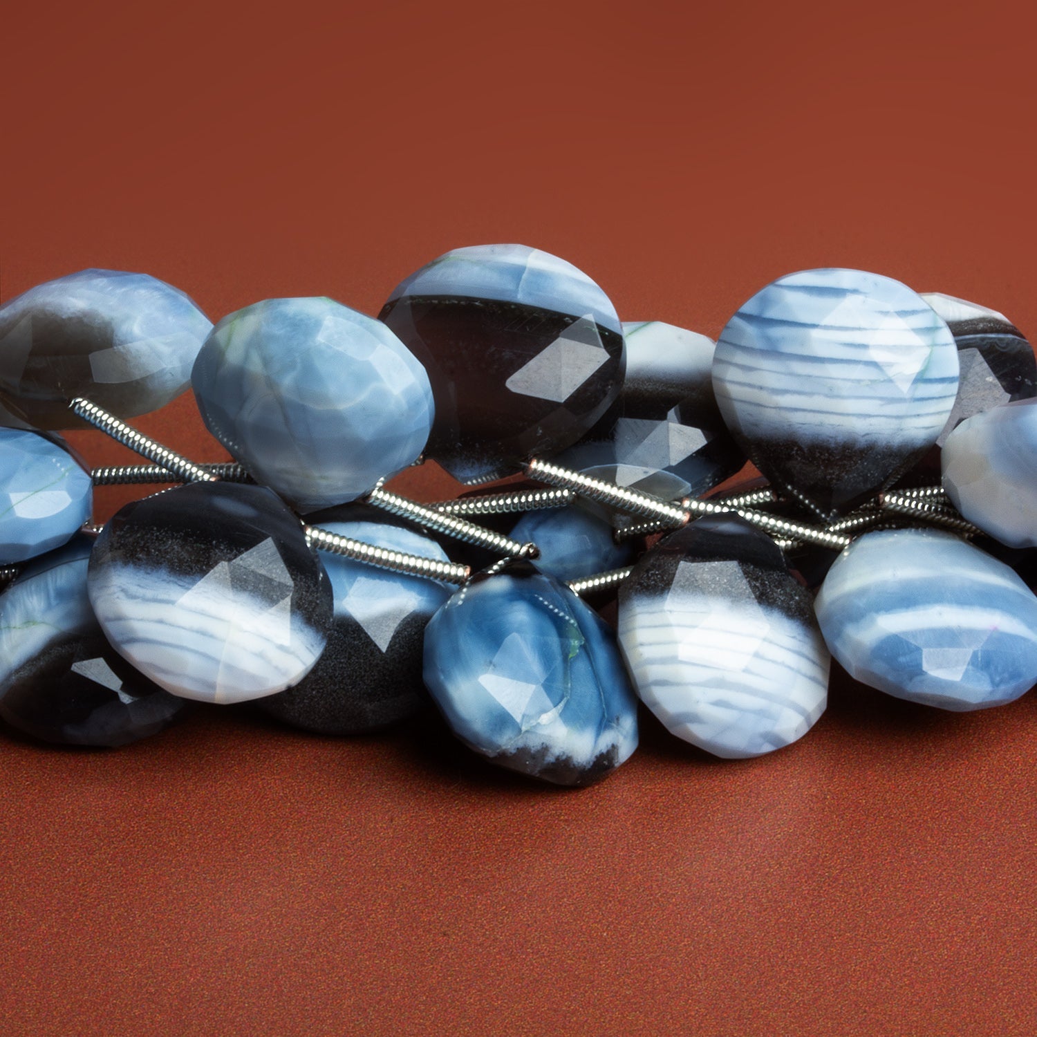 15mm Denim Opal Faceted Hearts 8 inch 11 beads - The Bead Traders