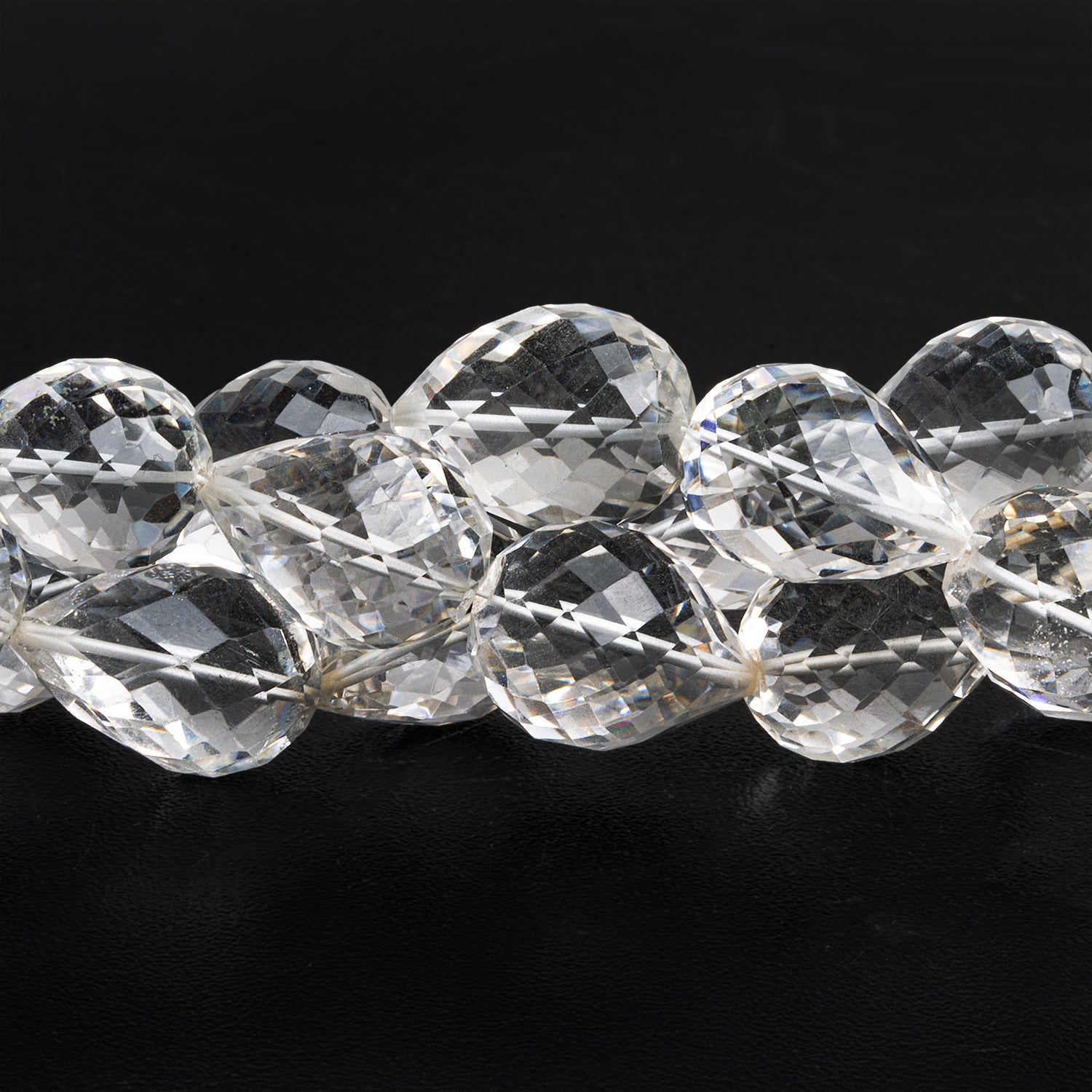 15x11mm Crystal Quartz Faceted Teardrops 9 inch 13 beads - The Bead Traders