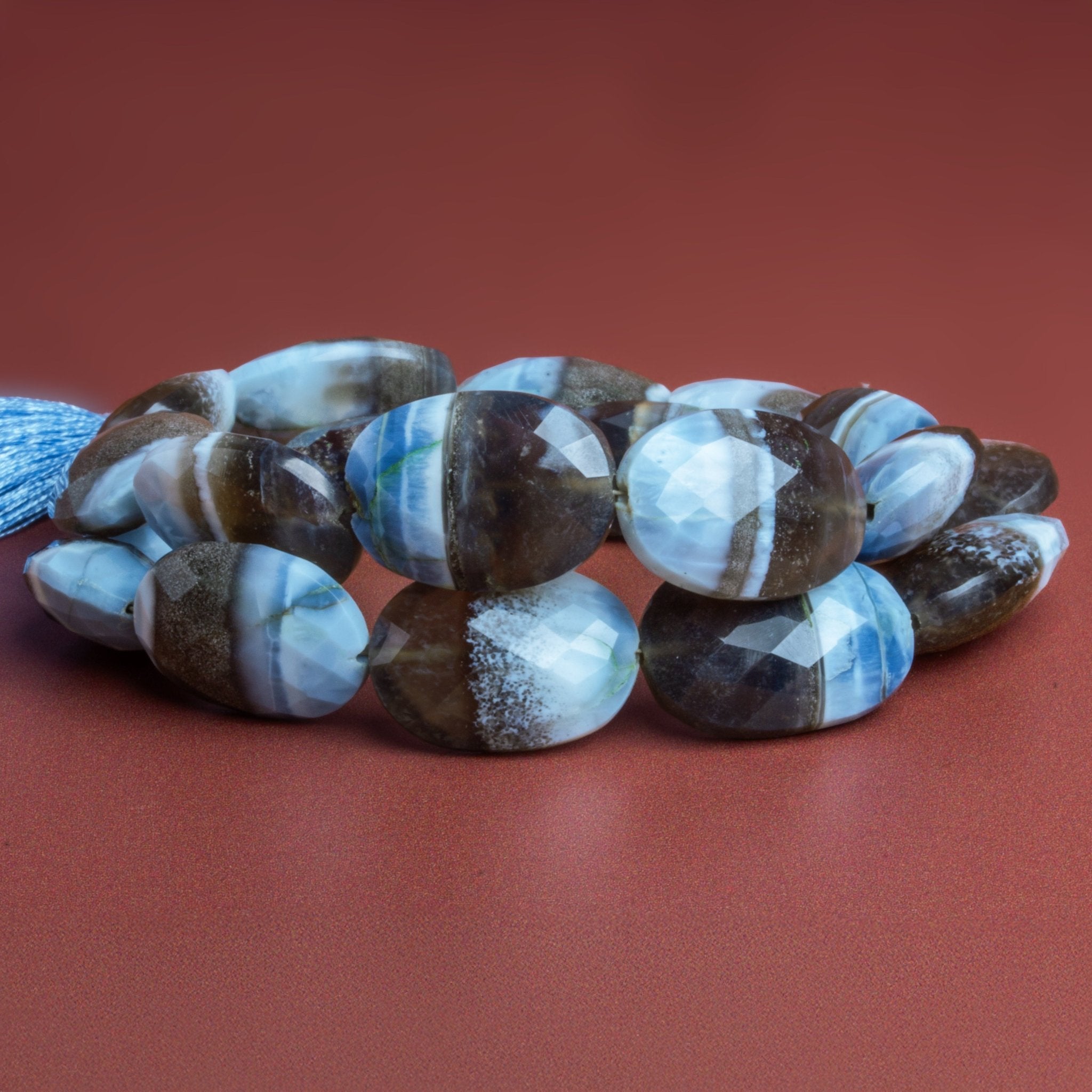 21x16mm Denim Opal Faceted Ovals 15 inch 18 beads - The Bead Traders