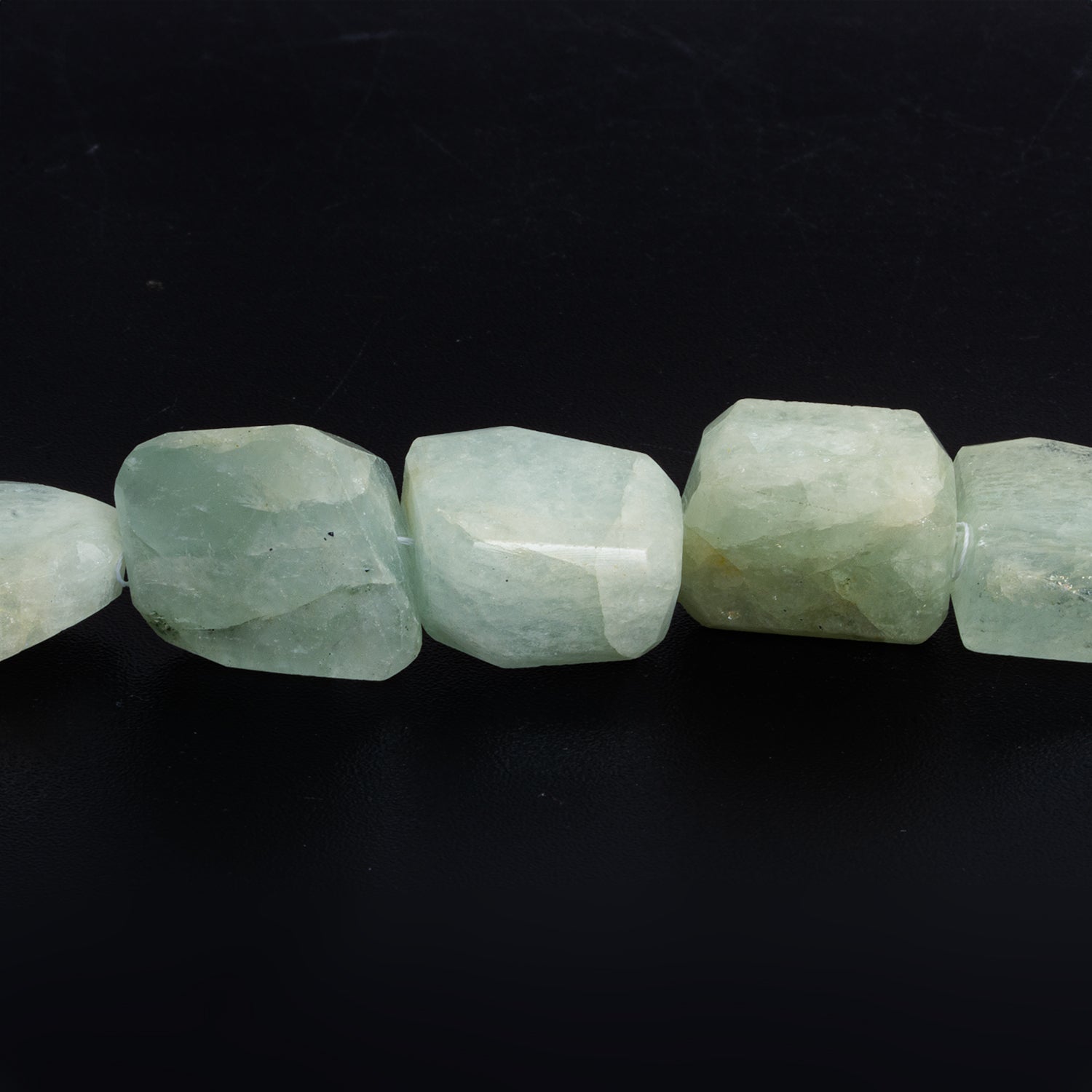 25x20mm Aquamarine Faceted Nuggets 14 inch 17 beads - The Bead Traders