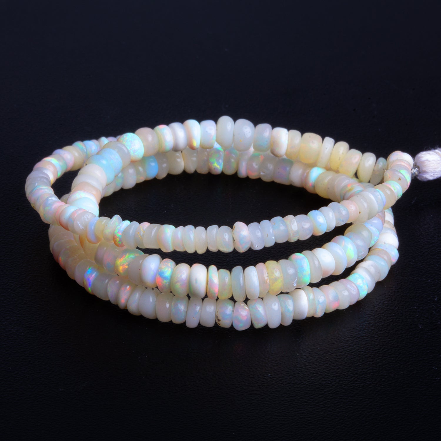 3 - 4.5mm White Ethiopian Opal Plain Rondelles 16 inch 205 beads - The Bead Traders