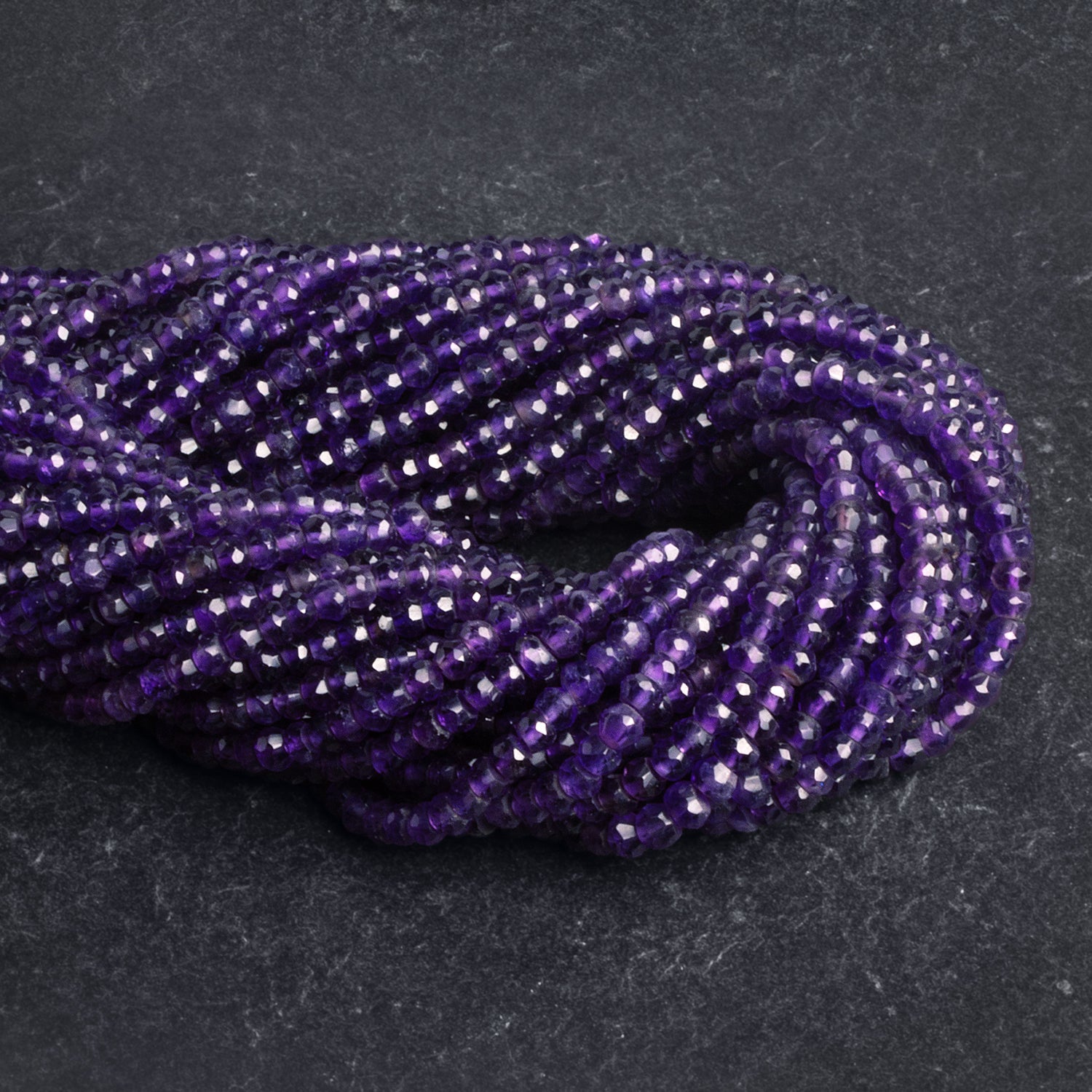 3.5 - 4mm Amethyst Handcut Faceted Rondelle Beads 13 inches 100 beads - The Bead Traders