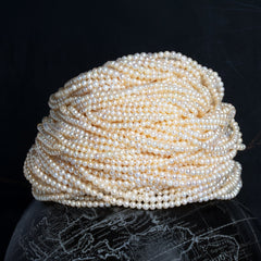 Off Round Freshwater Pearls