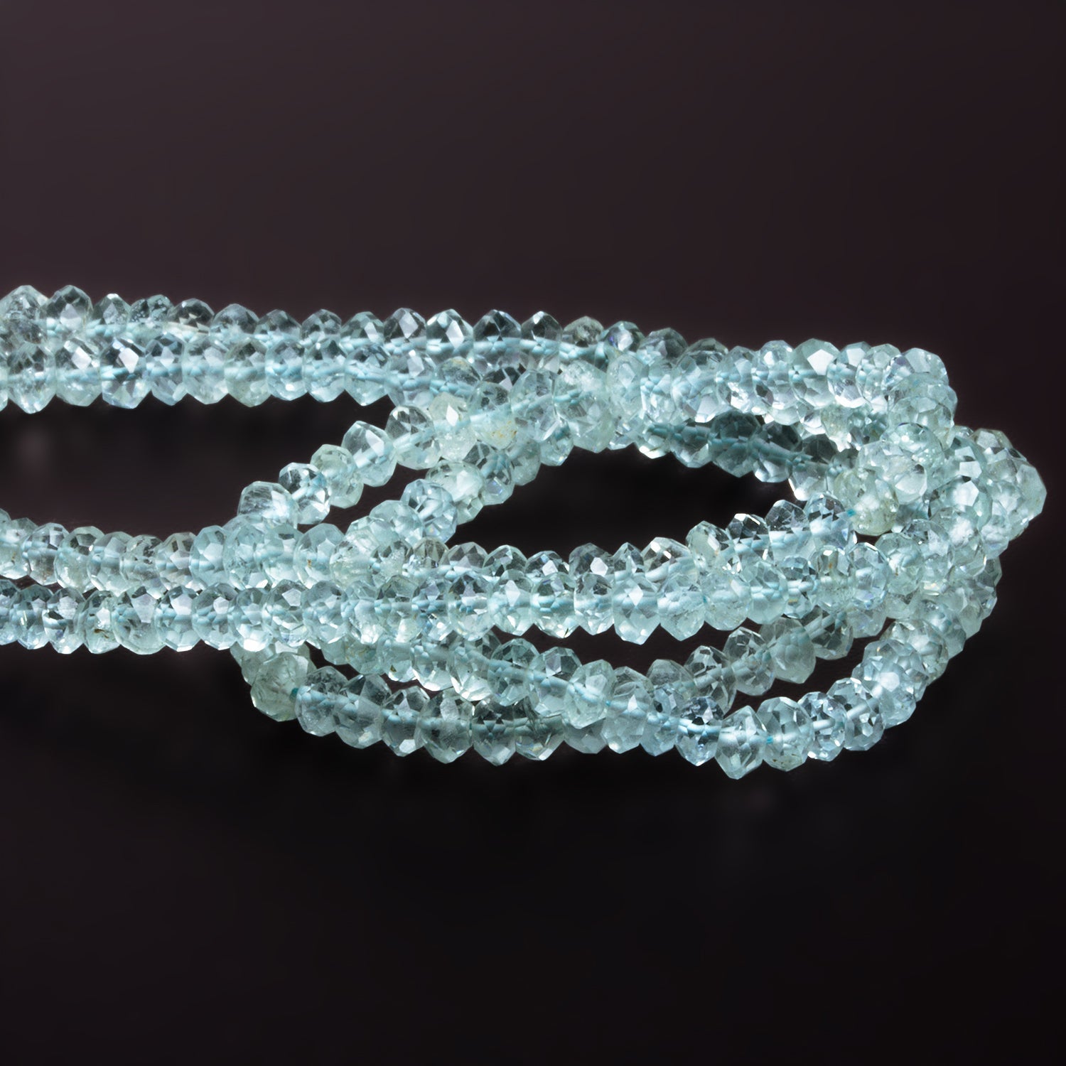 4-5mm Aquamarine Faceted Rondelles 12 inch 115 beads - The Bead Traders