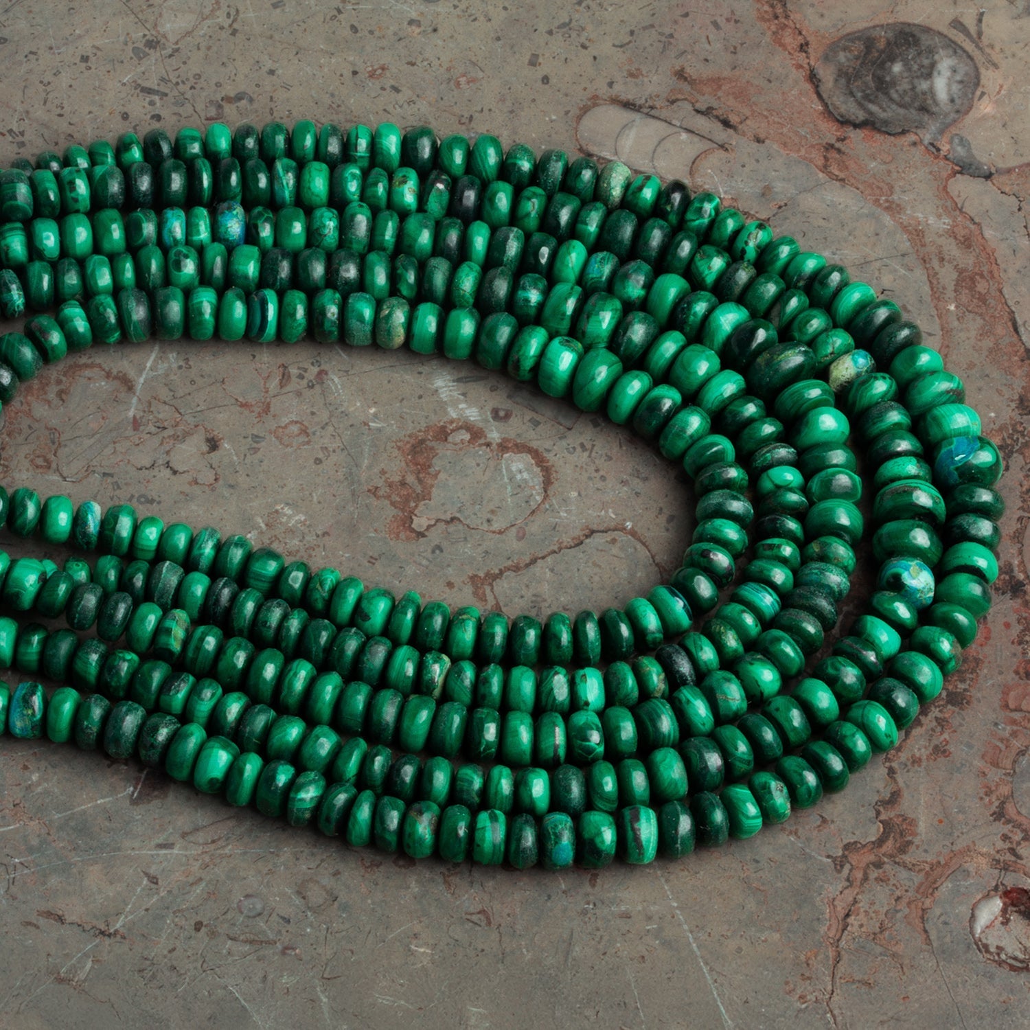 4 - 6mm Malachite Plain Rondelles 16 inch 135 beads - The Bead Traders