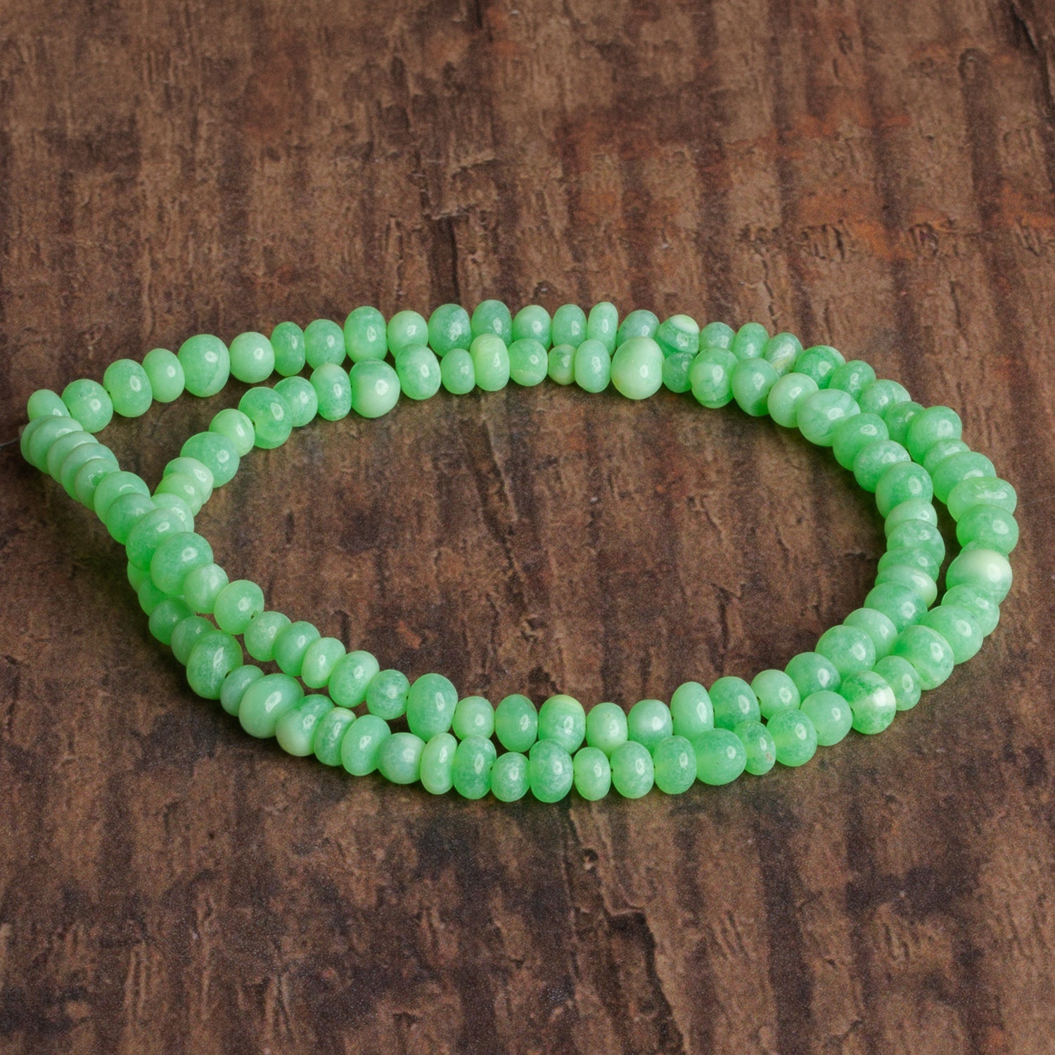 4 - 8mm Green Opal Plain Rondelles 16 inch 90 beads - The Bead Traders