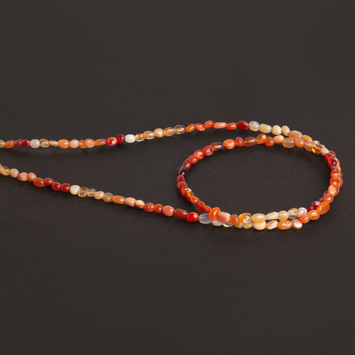 4.5x3mm Fire Opal Plain Nuggets 18 inch 110 beads - The Bead Traders
