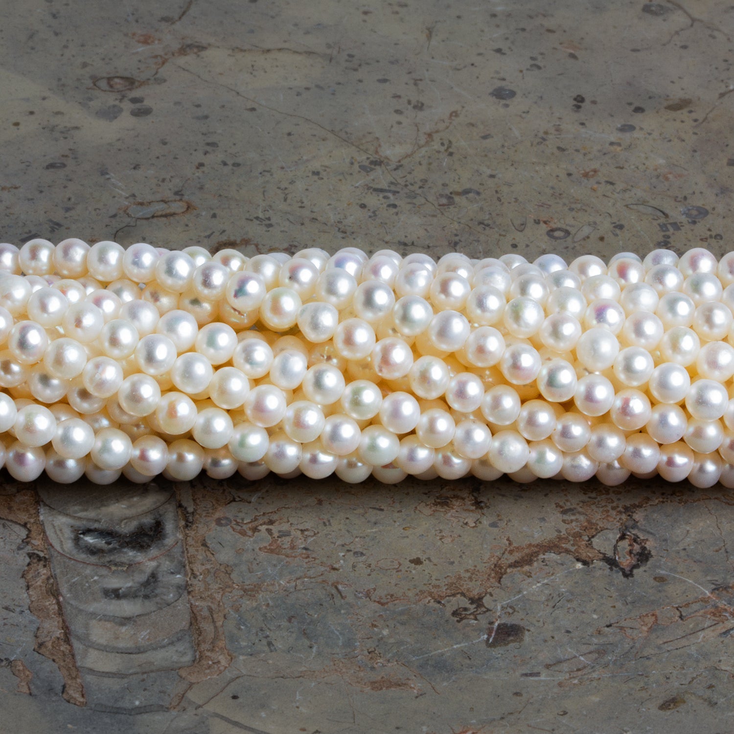4mm Creamy White Near Round Pearls 15 inch 105 beads - The Bead Traders