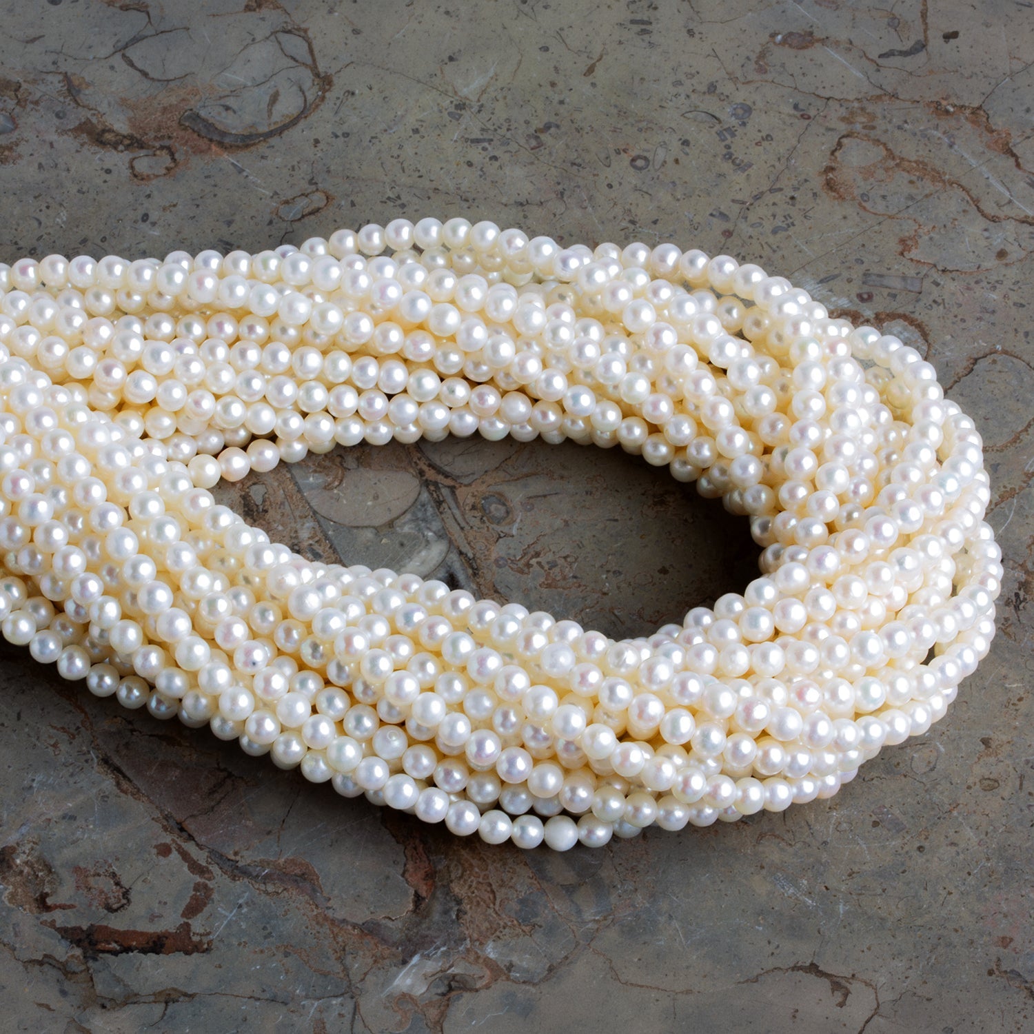 4mm Creamy White Near Round Pearls 15 inch 105 beads - The Bead Traders