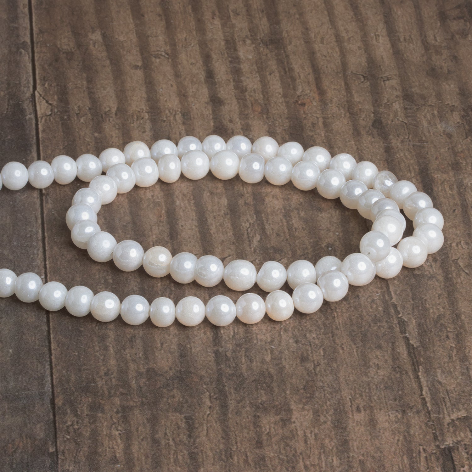 5-6.5mm Mystic Quartz Plain Rounds 16 inch 63 beads - The Bead Traders