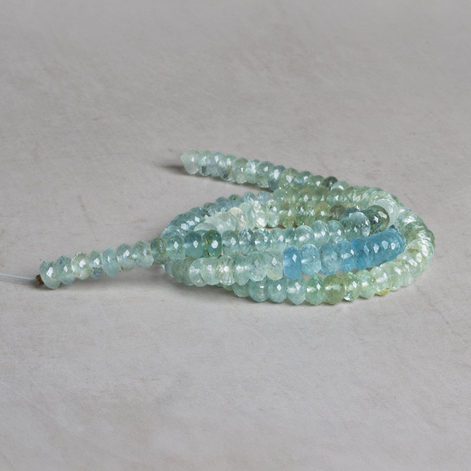 5mm Aquamarine Plain Rondelles 15 inch 110 beads - The Bead Traders