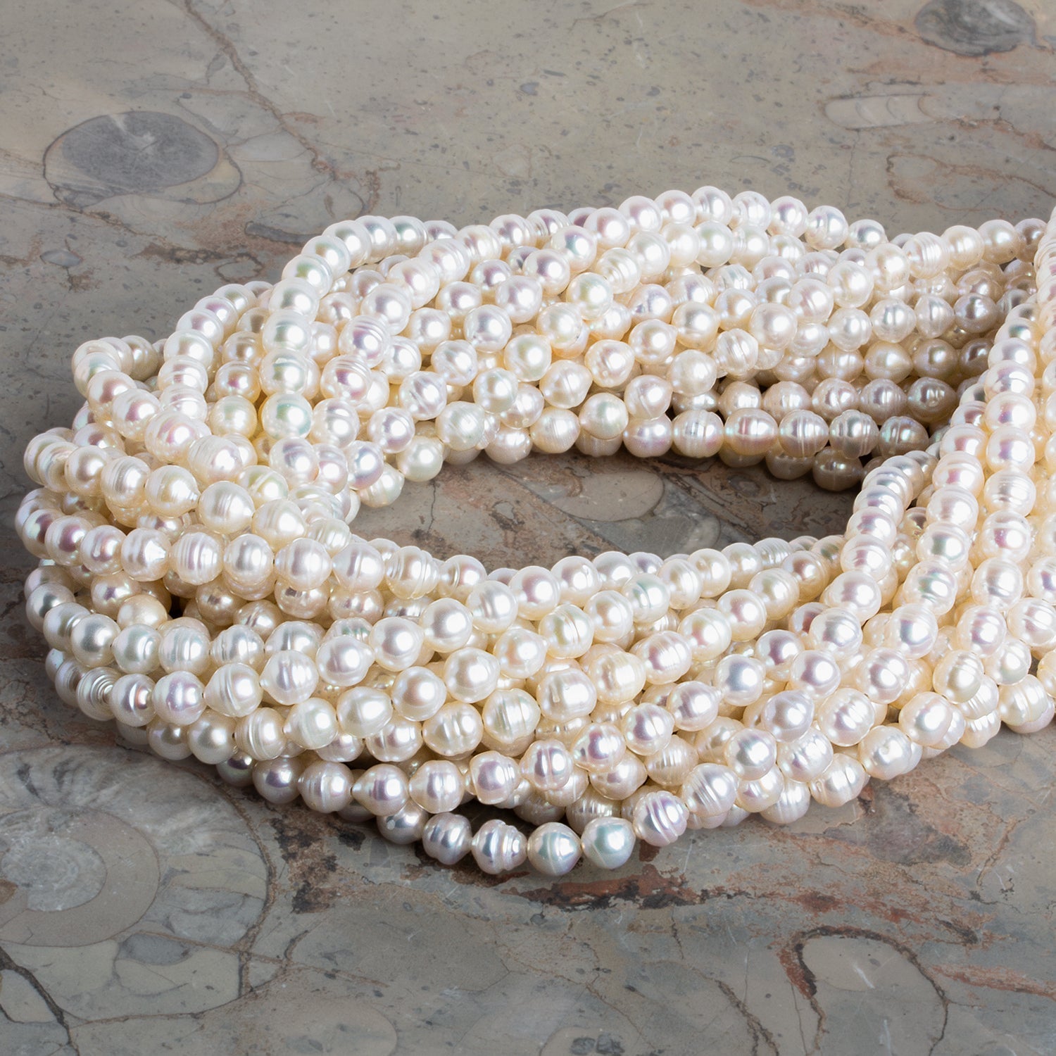 5mm Cream Petite Ringed Baroque Pearls 15 inch 75 beads - The Bead Traders