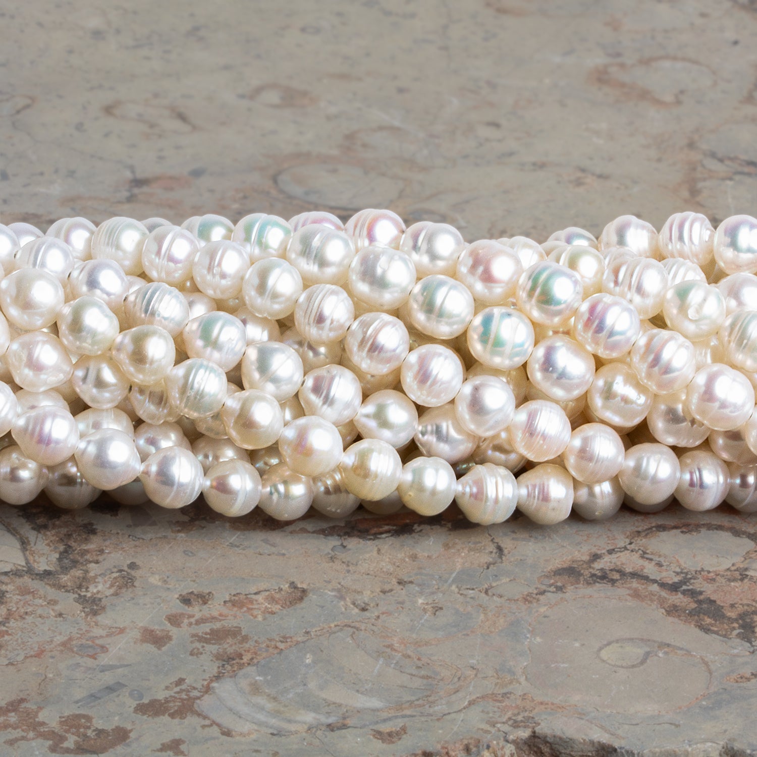5mm Cream Petite Ringed Baroque Pearls 15 inch 75 beads - The Bead Traders