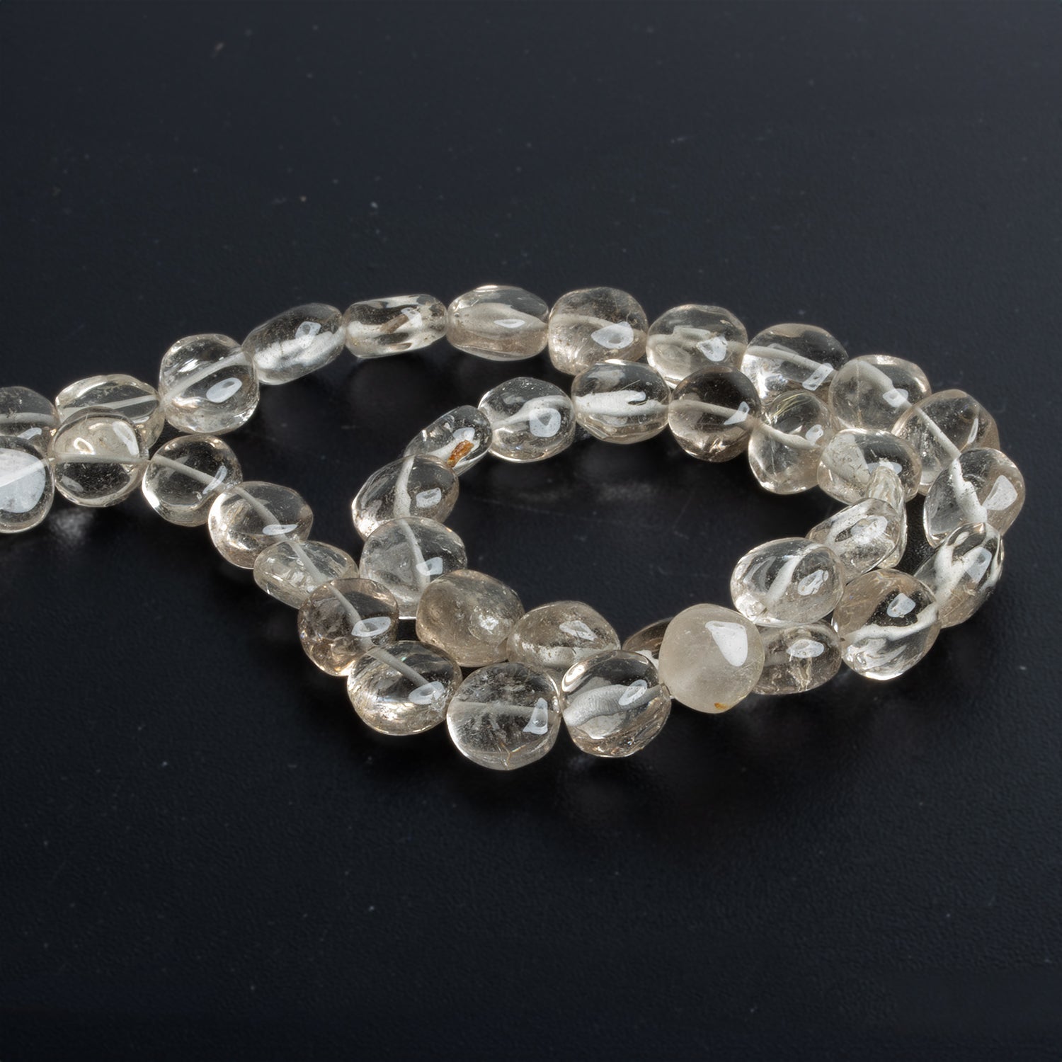 6 - 10mm Rutilated Champagne Quartz Coins 16 inch 41 beads - The Bead Traders