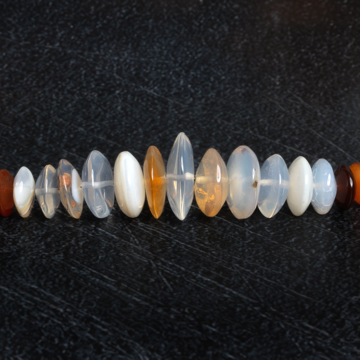 6-17mm Fire Opal Plain Discs 15 inch 100 beads - The Bead Traders