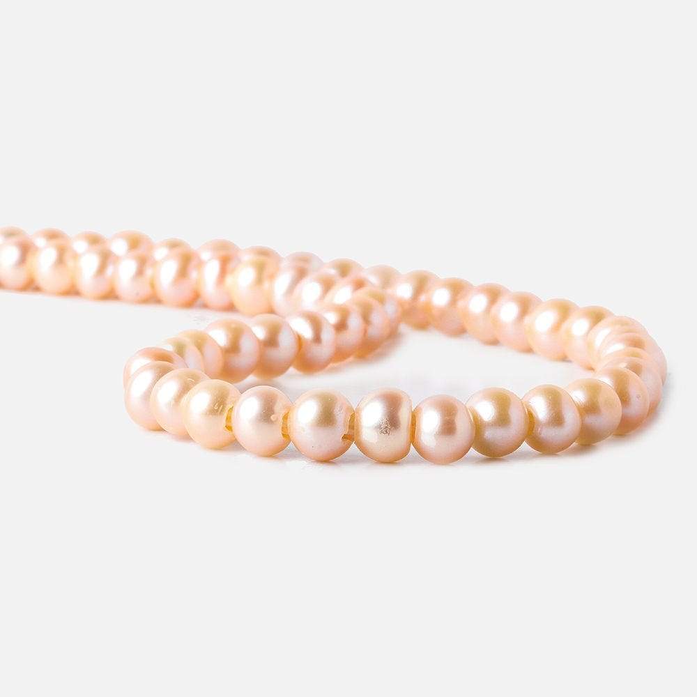 6 - 7mm Creamsicle Orange Large Hole Off Round Pearls 15 inch 75 beads - The Bead Traders