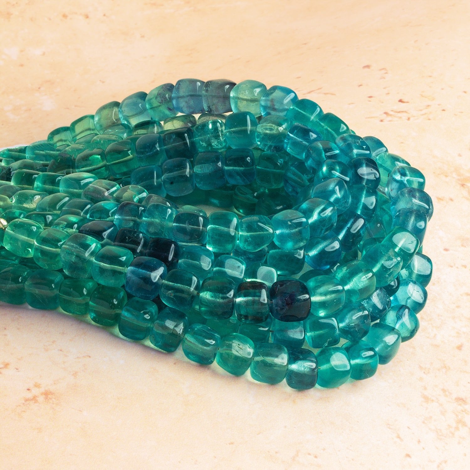 6 - 7mm Neon Teal Fluorite Plain Cubes 7.5 inch 27 beads AA Grade - The Bead Traders