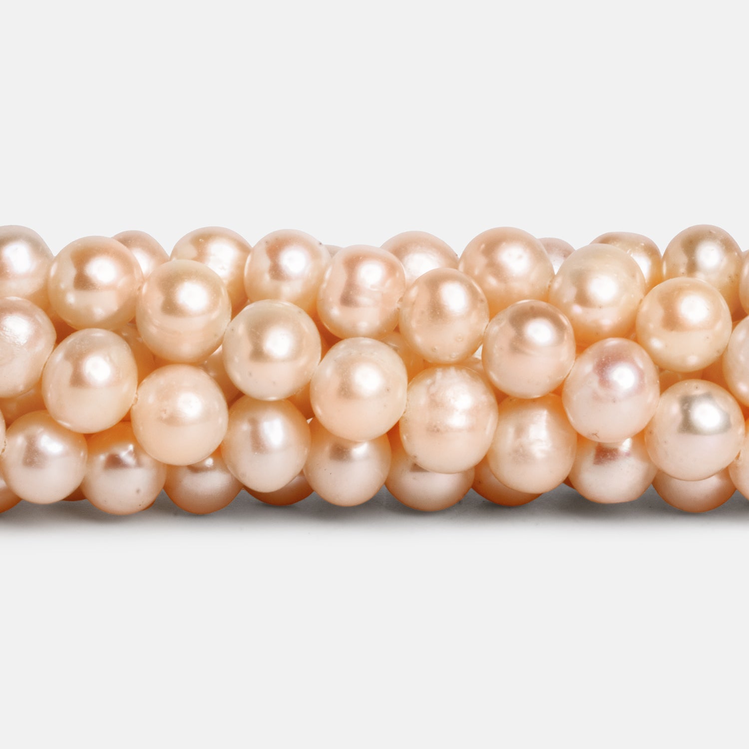 6 - 7mm Peach Off Round Pearls 15 inch 65 beads - The Bead Traders