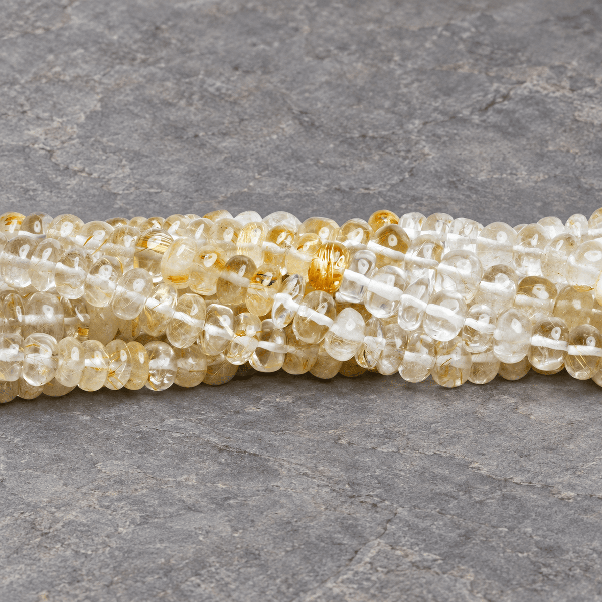 6-8mm Rutilated Quartz Plain Rondelles 16 inch 90 beads - The Bead Traders