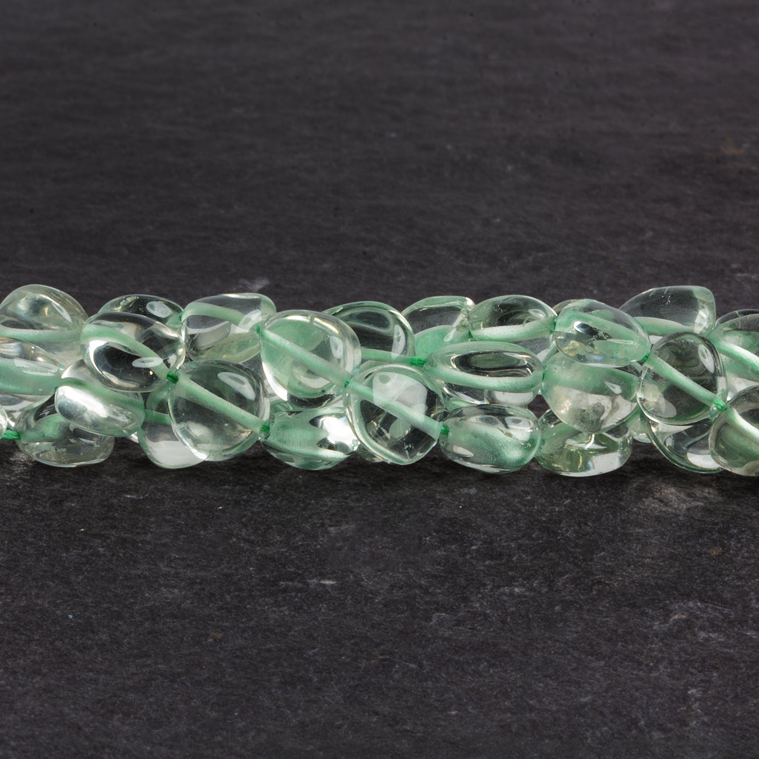 6 - 9mm Prasiolite Plain Hearts 14 inch 42 beads - The Bead Traders