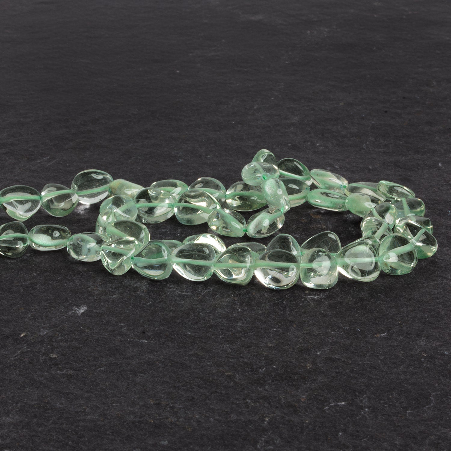 6 - 9mm Prasiolite Plain Hearts 14 inch 42 beads - The Bead Traders