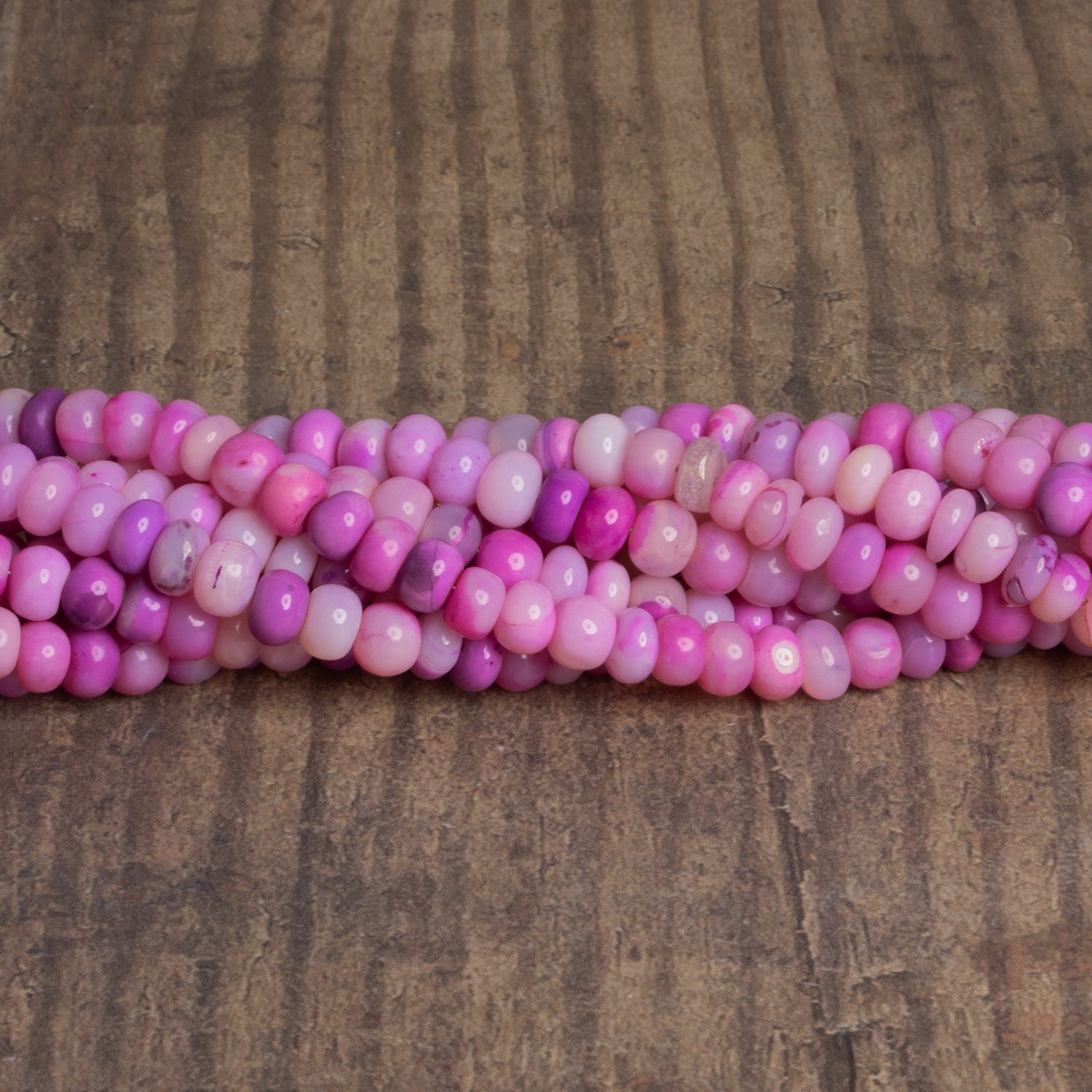 6.5mm Princess Pink Opal Plain Rondelles 16 inch 90 beads - The Bead Traders
