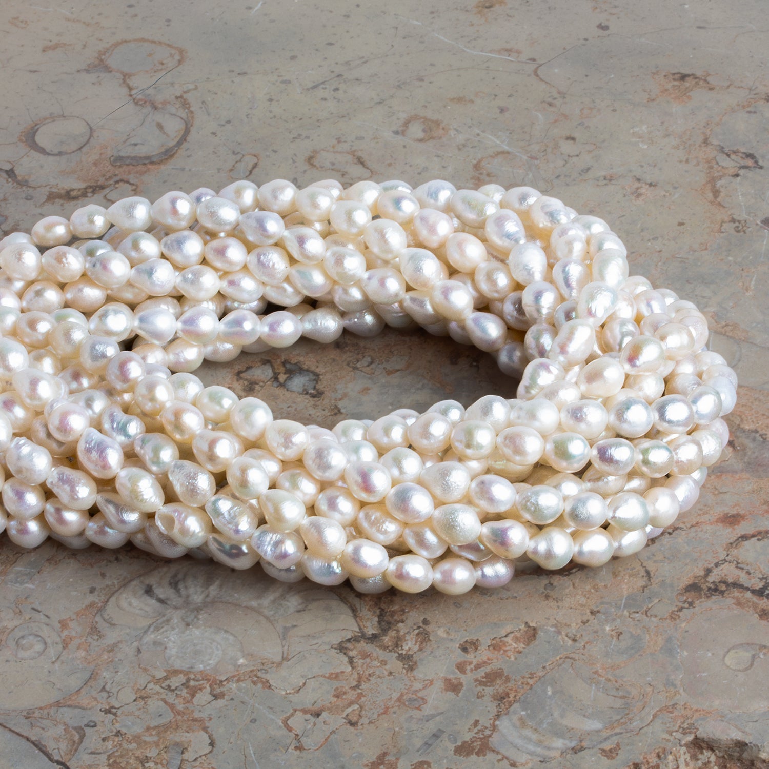 6.5x5mm Cream Petite Baroque Pearls 15 inch 56 beads - The Bead Traders