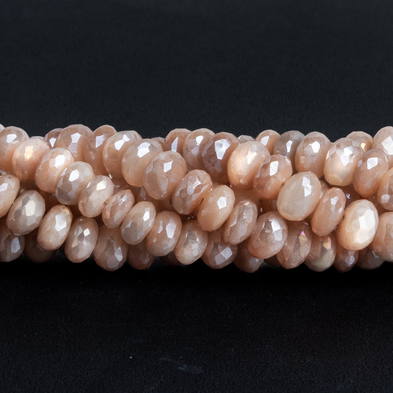 6mm Mystic Peach Moonstone Faceted Rondelles 7.5 inch 45 beads - The Bead Traders