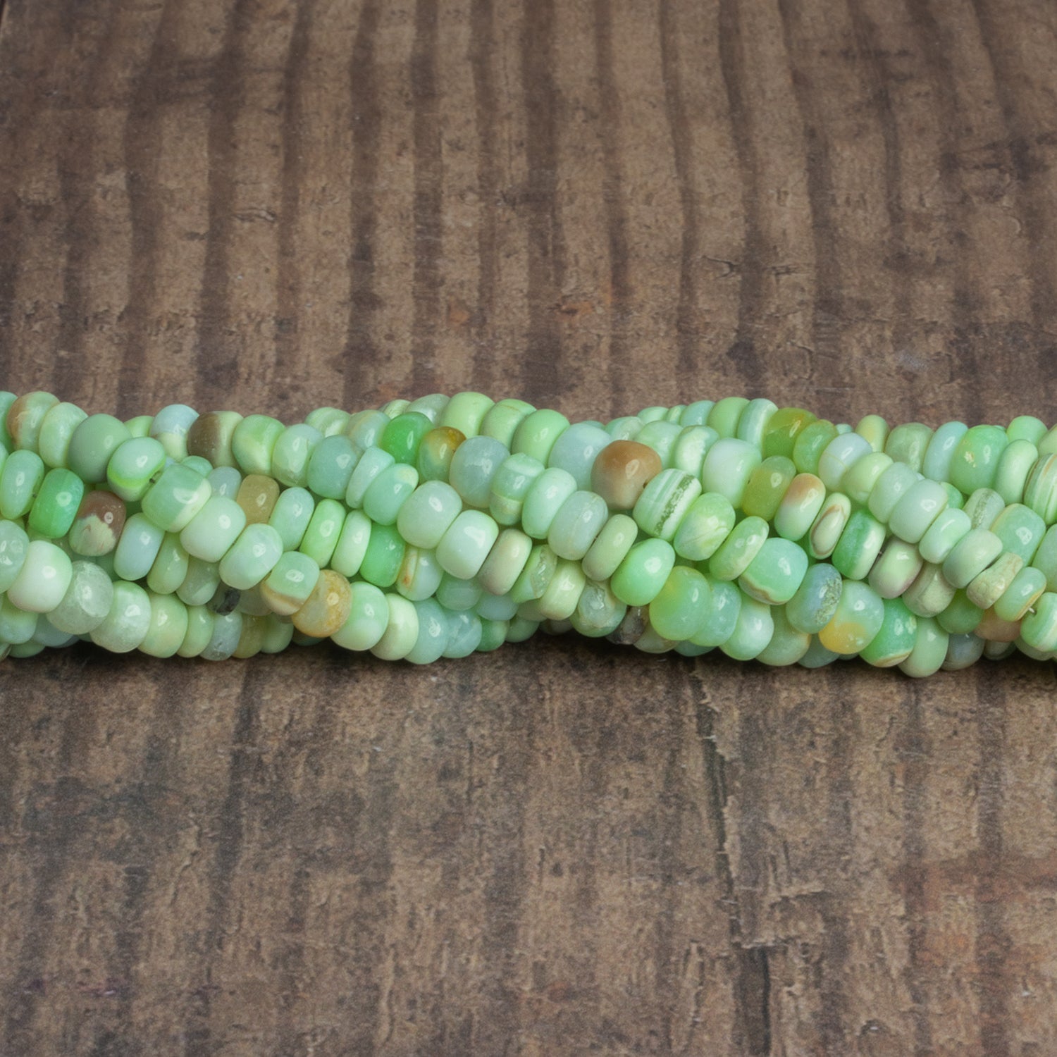 6mm Spring Green Opal Plain Rondelles 16 inch 100 beads - The Bead Traders