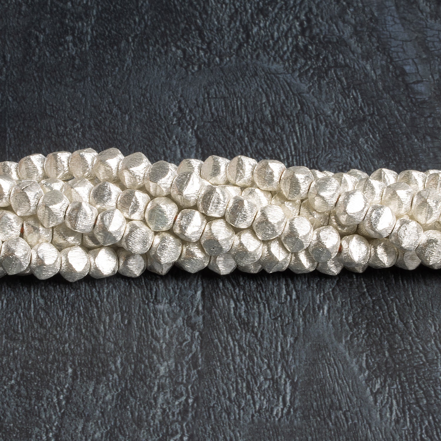 6mm Sterling Silver plated Copper Brushed Rounded Faceted Nuggets 8 inch 35 beads - The Bead Traders