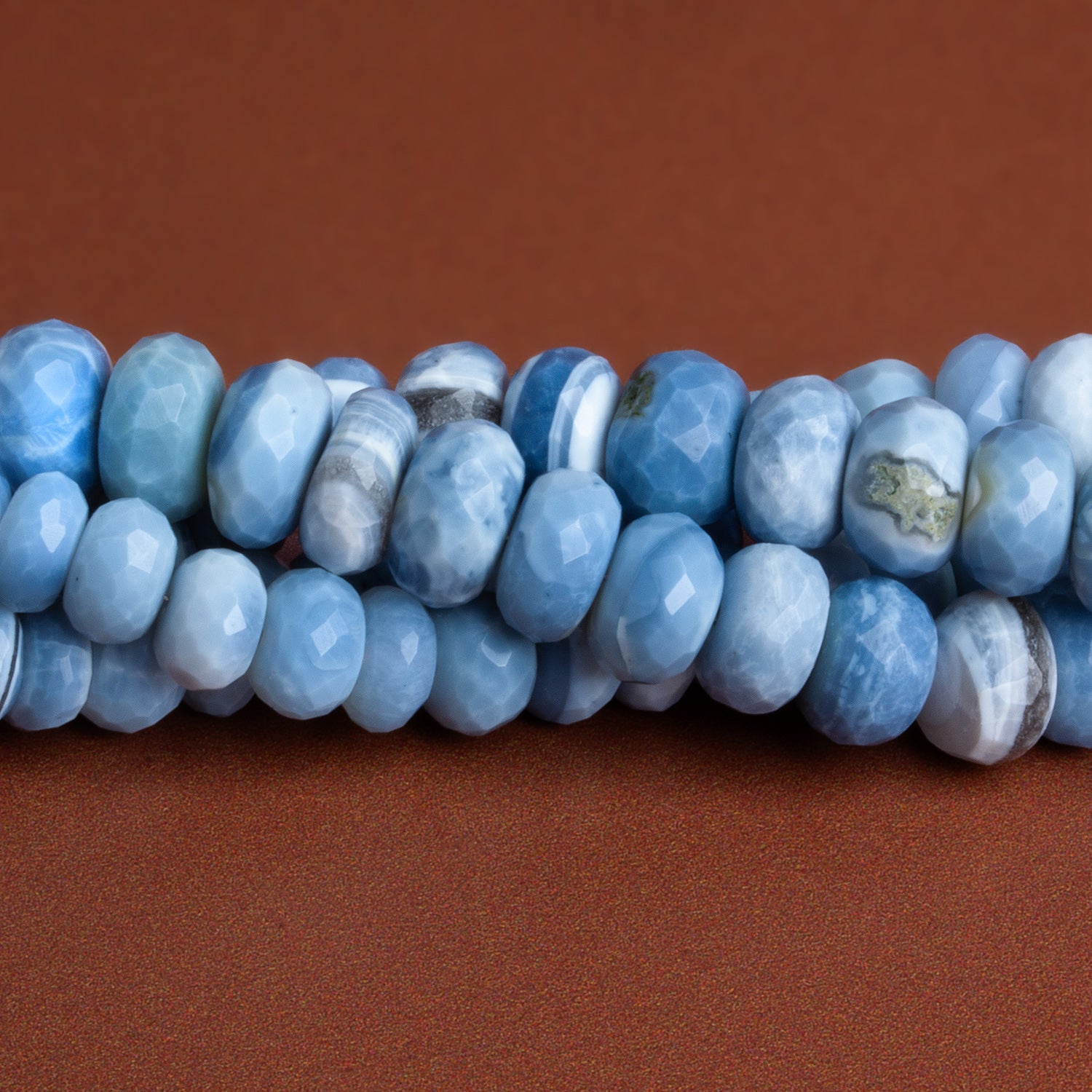 7 - 11mm Denim Opal Faceted Rondelles 16 inch 73 beads - The Bead Traders