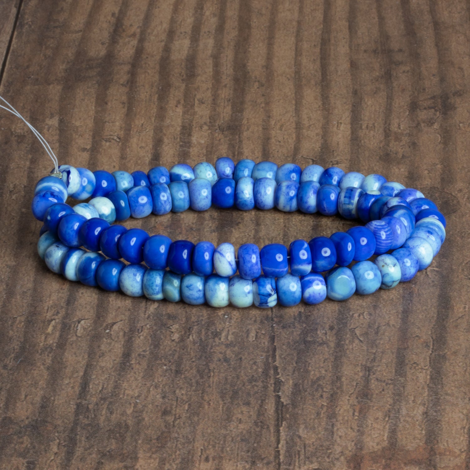 7 - 9mm Blue Opal Plain Rondelles 16 inch 68 beads - The Bead Traders
