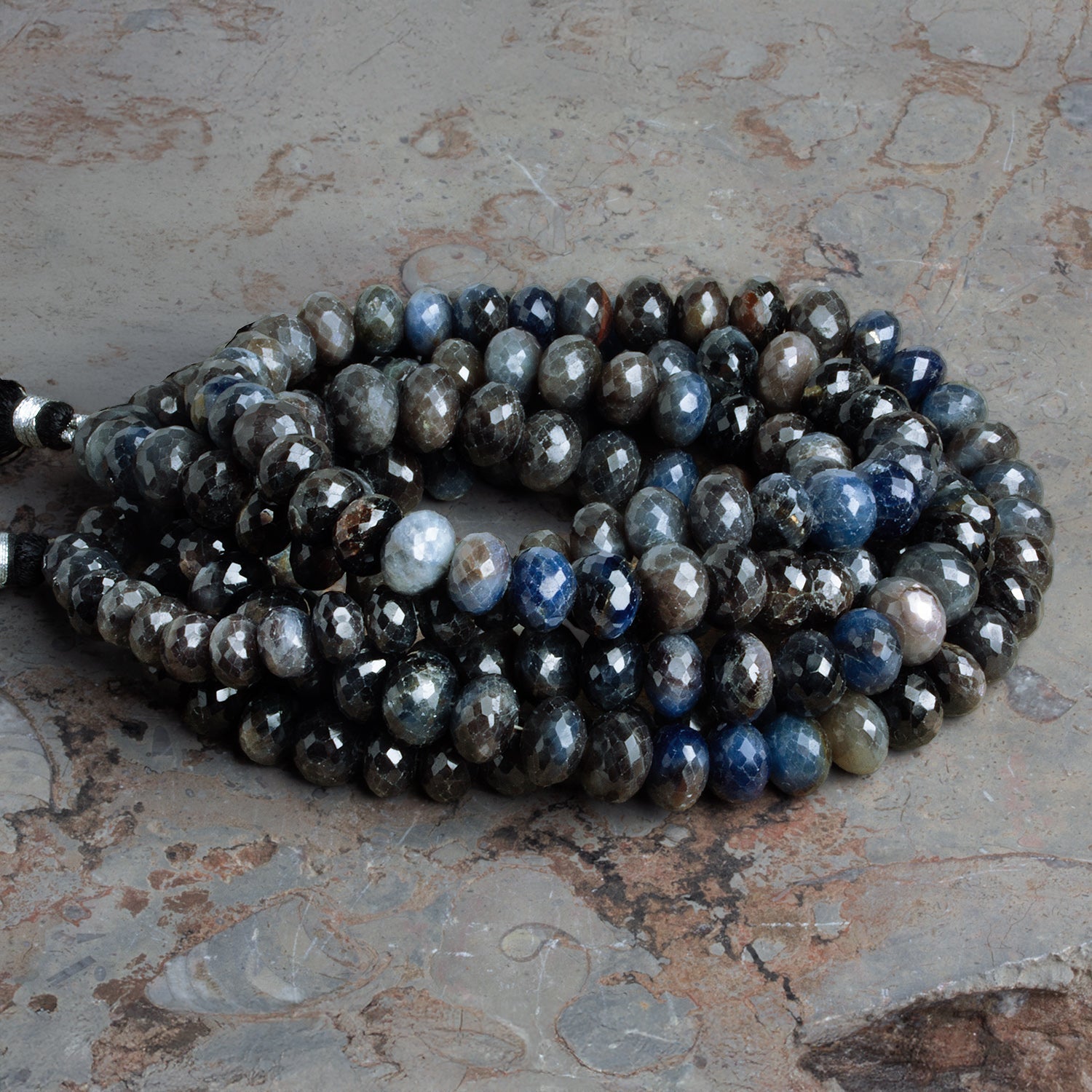 7 - 9mm Sapphire Faceted Rondelle Beads 16 inch 68 beads - The Bead Traders