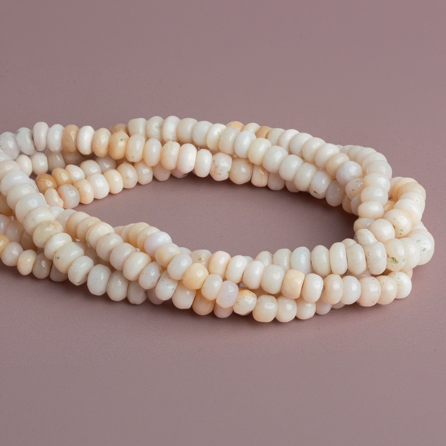 7mm Pink Peruvian Opal Plain Rondelles 15 inch 85 beads - The Bead Traders