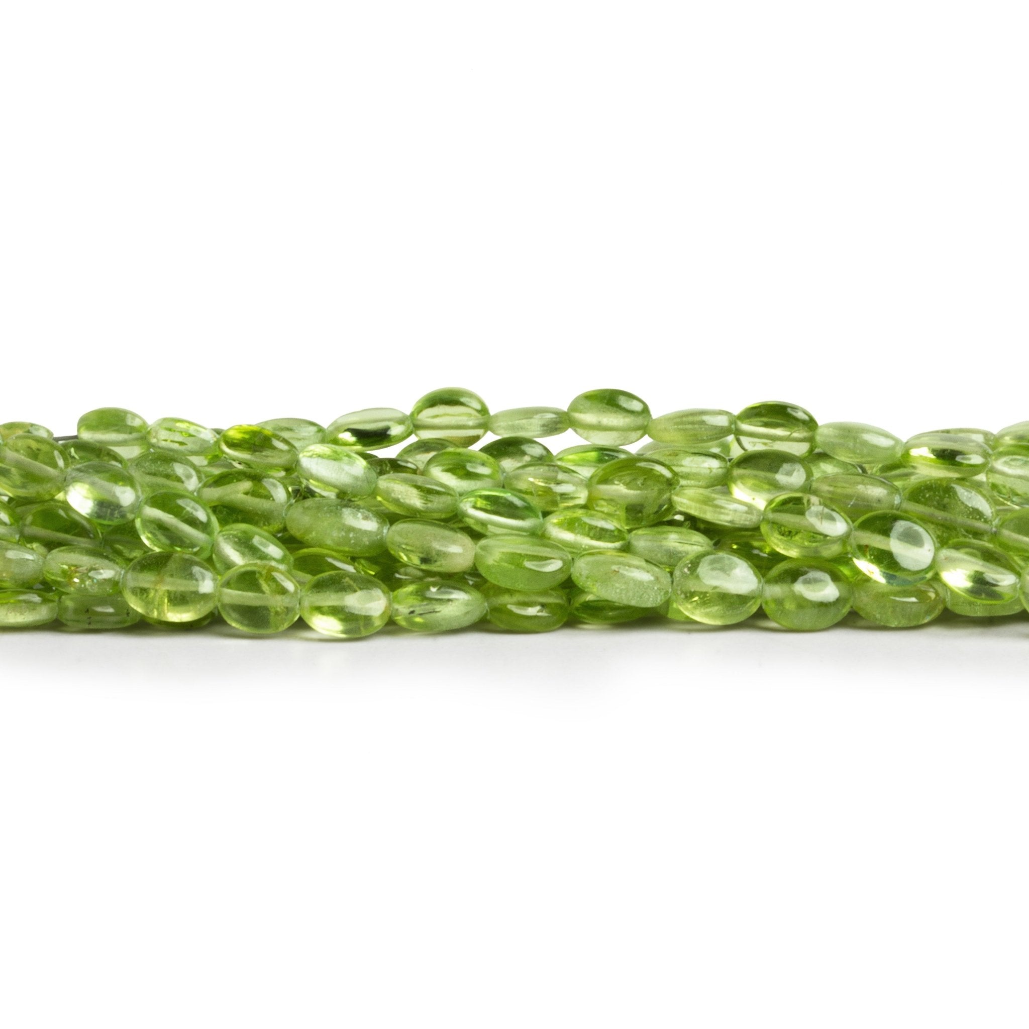 7x5mm Peridot Plain Ovals 15 inch 72 beads - The Bead Traders