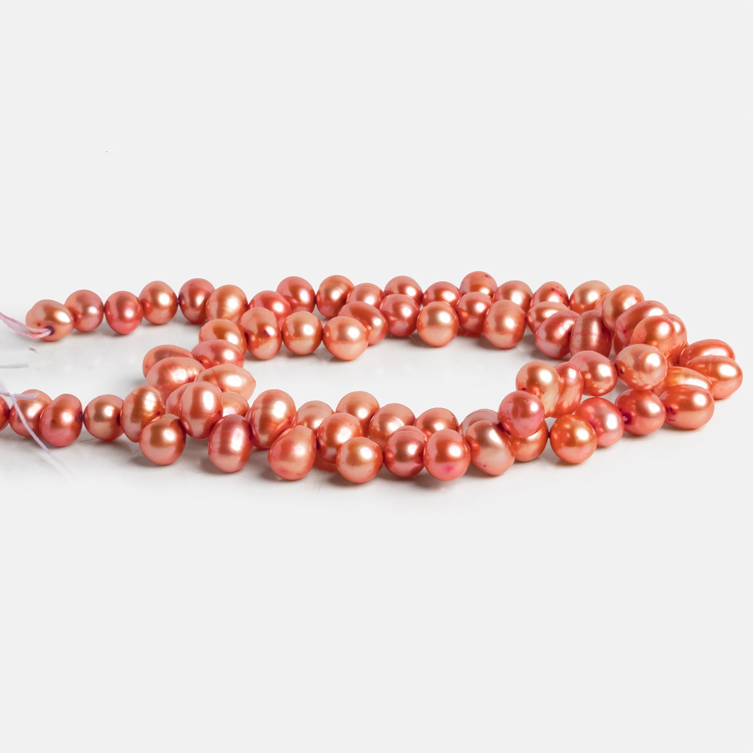 7x5mm Salmon Baroque Pearls 15 inch 75 beads - The Bead Traders