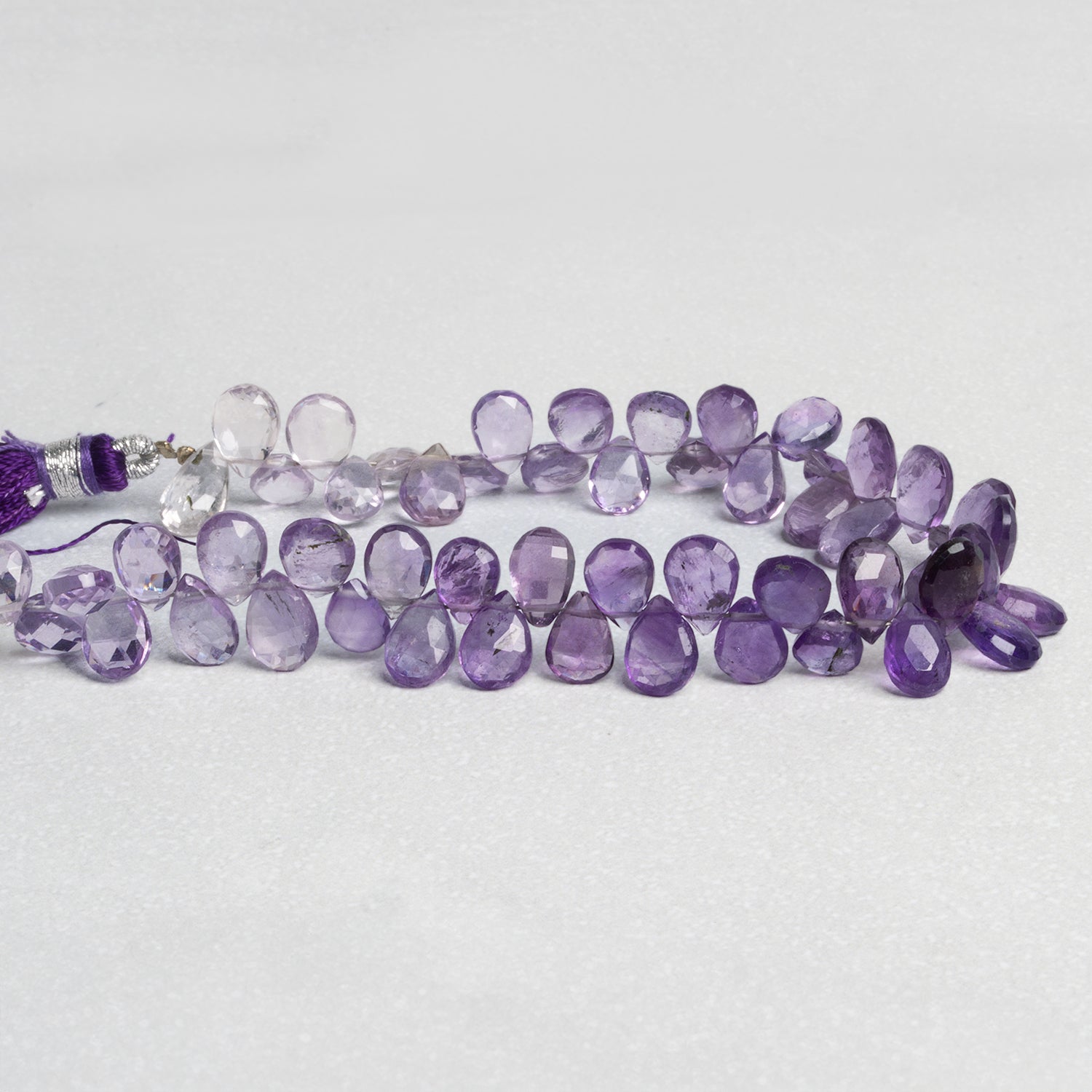 7x6mm Amethyst Faceted Pears 7 inch 51 beads - The Bead Traders