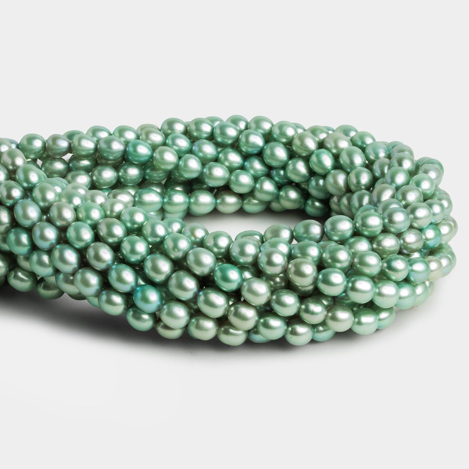 7x6mm Mint Oval Pearls 15 inch 55 beads - The Bead Traders