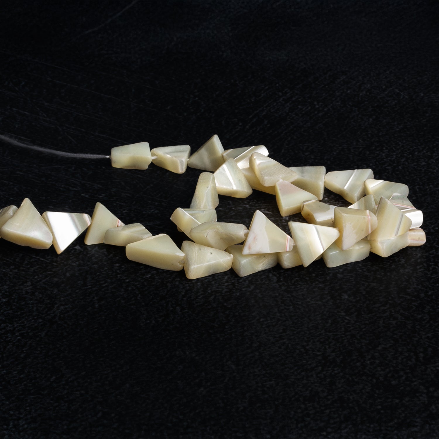 8 - 10mm Mother of Pearl Plain Triangles 12 inch 40 beads - The Bead Traders