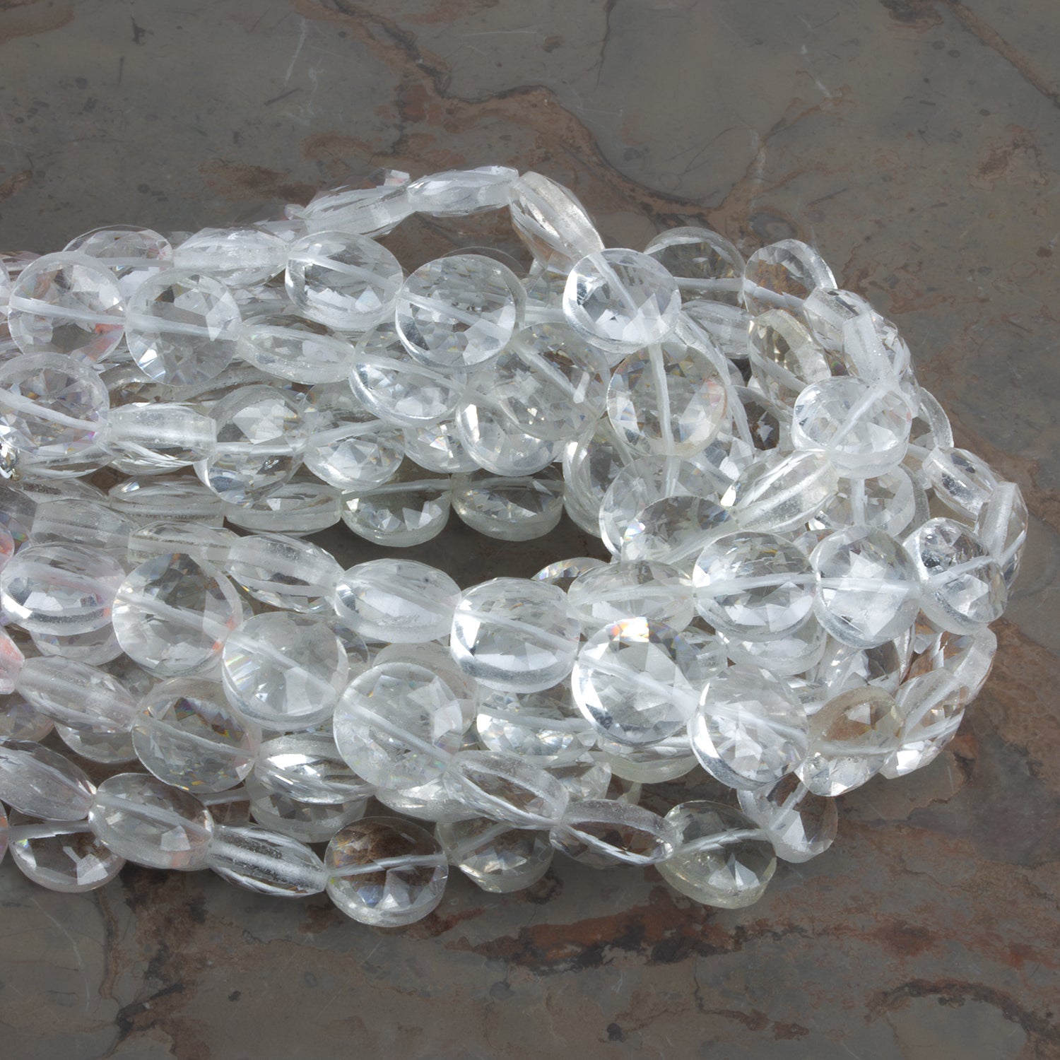 8mm Crystal Quartz Faceted Coins 7.5 inch 23 beads - The Bead Traders