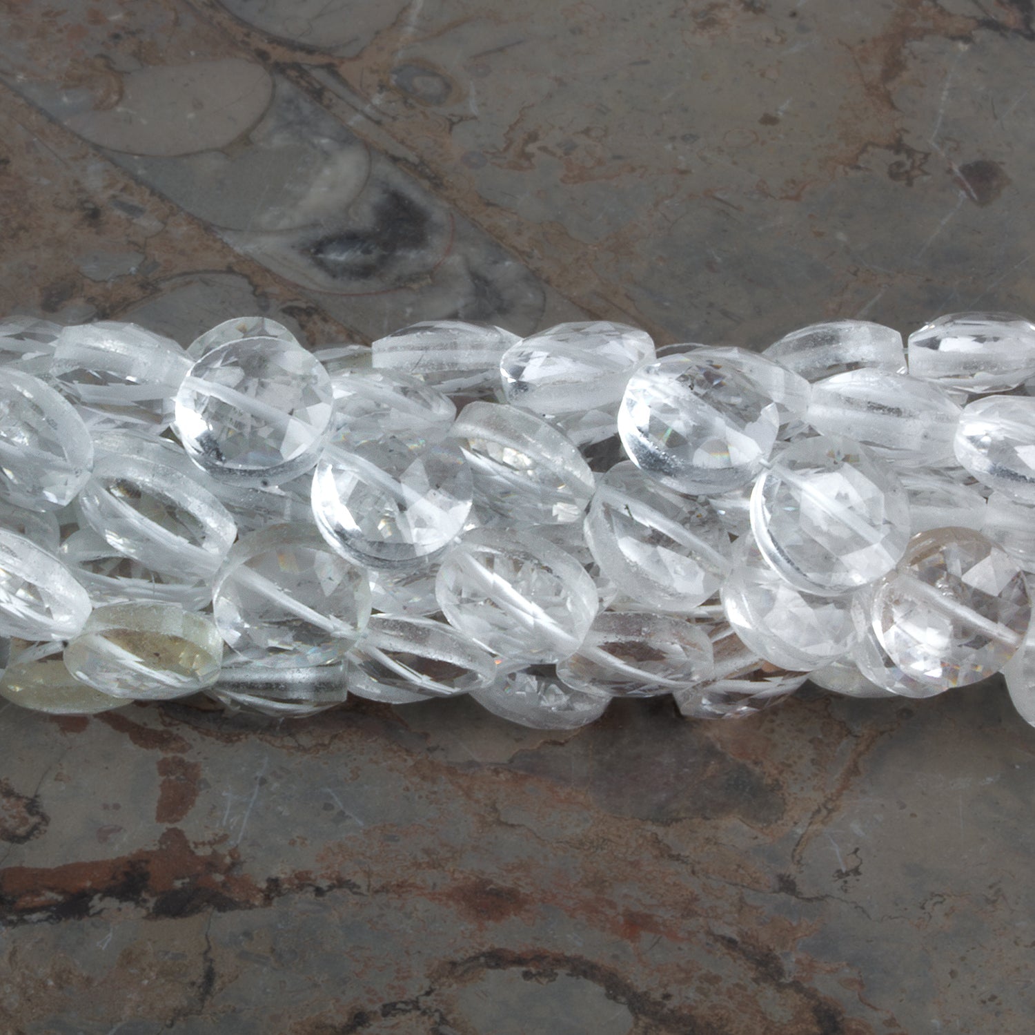 8mm Crystal Quartz Faceted Coins 7.5 inch 23 beads - The Bead Traders