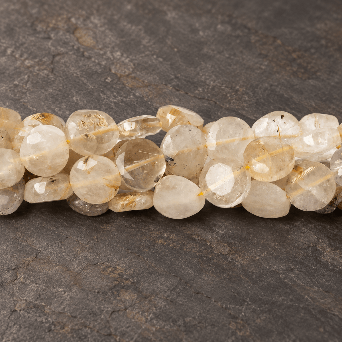 8mm Rutilated Quartz Faceted Coins 13.5 inch 44 beads - The Bead Traders