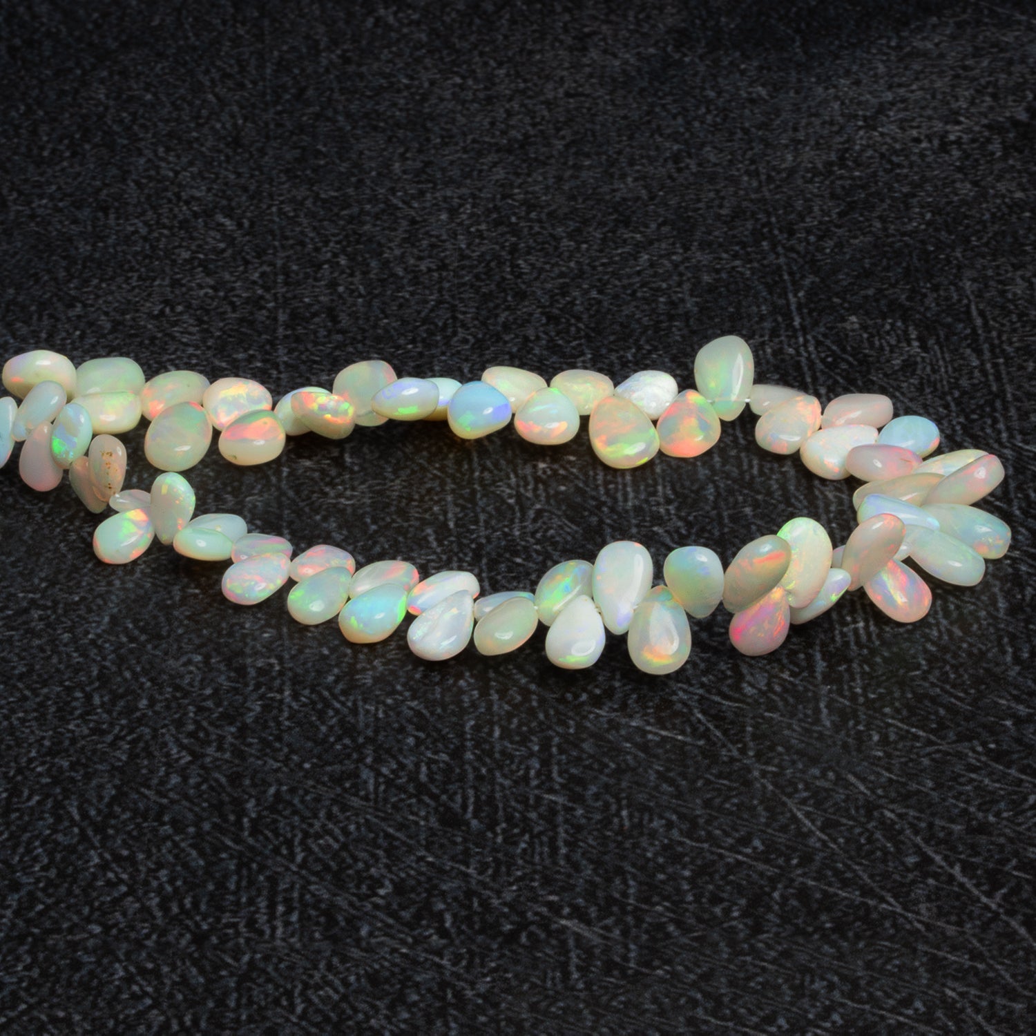 8x6mm Ethiopian Opal Plain Pears 9 inch 67 beads - The Bead Traders